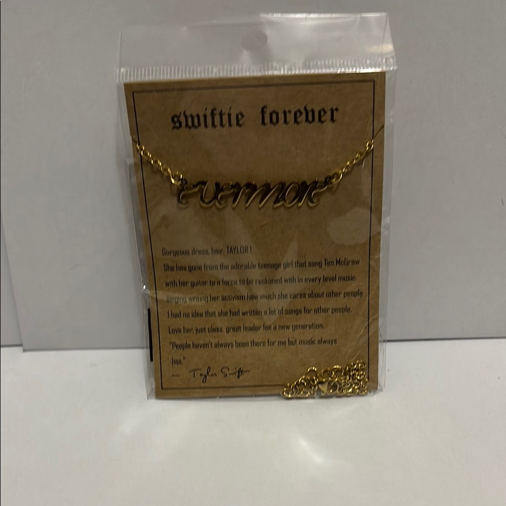 Taylor Swift Gold Script Necklace “ Evermore”